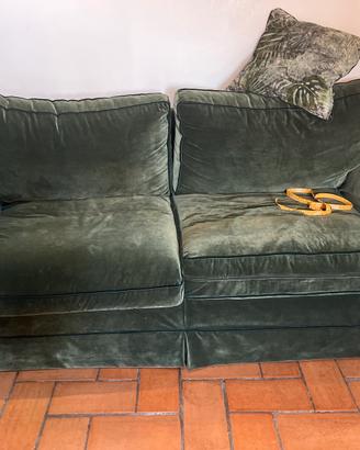 Divano verde scuro di confalone via appia roma