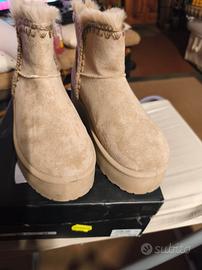 Stivaletti scamosciati beige n.39