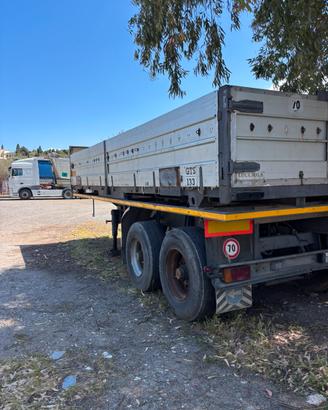 Semirimorchio porta container