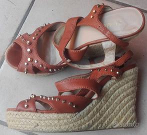 SANDALI DONNA CON ZEPPA E BORCHIE