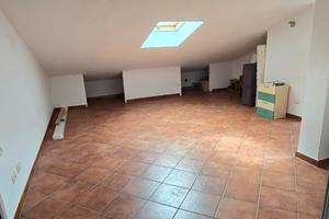 Luminosa mansarda in una bifamiliare