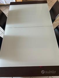 Tavolo Calligaris allungabile e sedie in pelle