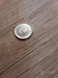 Rara micro moneta 50 lire piccola.