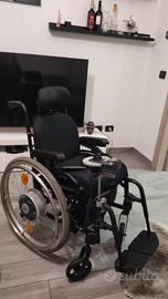 sedia a rotelle elettricicata