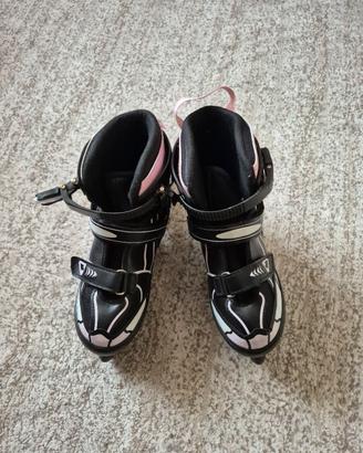 Pattini con freno e luci 