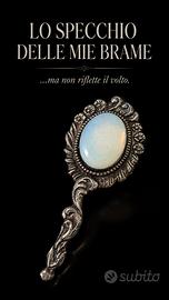 Antica spilla a guisa di specchietto opalite