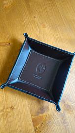 Svuota tasche in pelle.