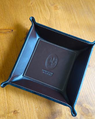 Svuota tasche in pelle.