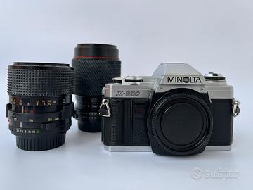 Minolta x300 con obiettivi zoom