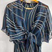 Abito in seta con coprispalle 