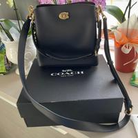 Borsa a tracolla e  a braccio in pelle Coach