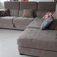 divano angolare letto e penisola contenitore