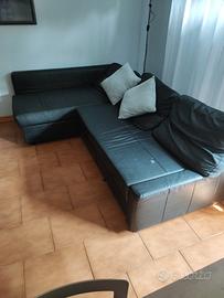 divano con penisola cassetto e letto 