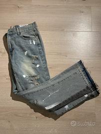 jeans flared blu con strappi taglia M