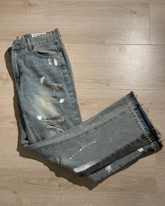 jeans flared blu con strappi taglia M