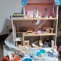 casa delle bambole in legno con accessori
