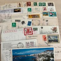 Lotto di 31 cartoline/ francobolli varie paesi