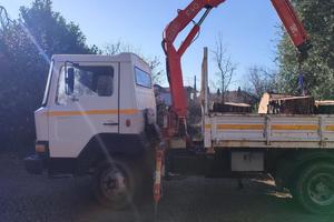 nissan con gru fassi f 40