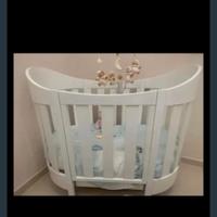 culla come nuova  firmata pali in legno bianca