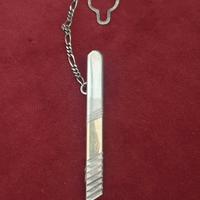Fermacravatta argento ed oro
