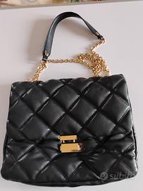 Deliziosa borsa nera H & M trapuntata con chiusura