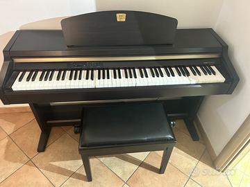 Pianola Clavinova con tasti pesati