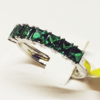 Veretta a sette pietre tipo smeraldi oro bianco