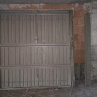 Portone basculante in ferro zincato