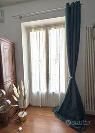 Tende laterali e cuscini abbinati