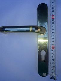 Maniglie per porta in ottone dorato