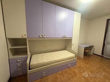 Camera singola con bagno condiviso