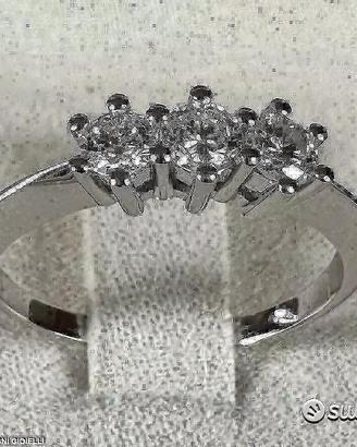 ANELLO TRILOGY ORO 18kt. E DIAMANTI NATURALI 0,52