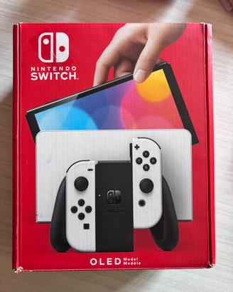 Nintendo Switch OLED Bianca + 3 Giochi