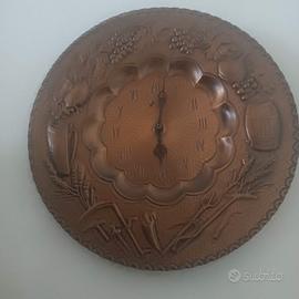 orologio  in rame martellato