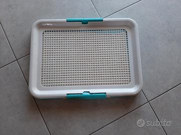 Supporto tappetini igienici 