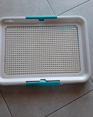 Supporto tappetini igienici 