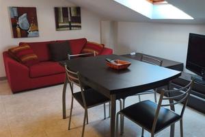 Elegante mansarda con tetto di proprietà