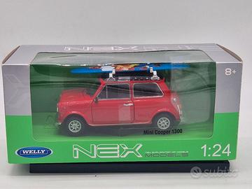 MORRIS Mini Cooper con surf - Welly - Scala 1/24