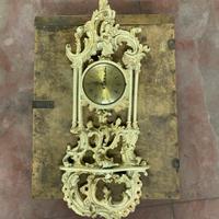 Orologio da parete in legno intagliato