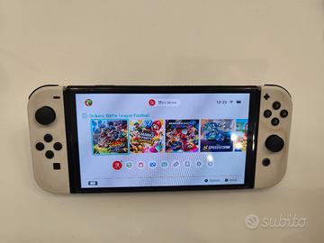 Nintendo Switch OLED + 5 giochi + garanzia