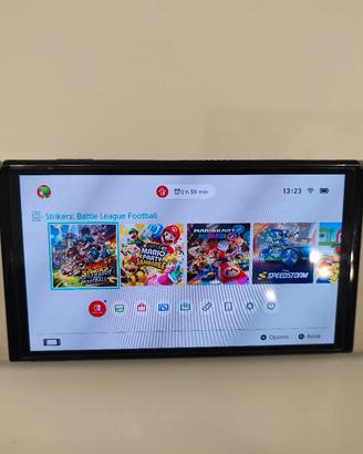 Nintendo Switch OLED + 5 giochi + garanzia