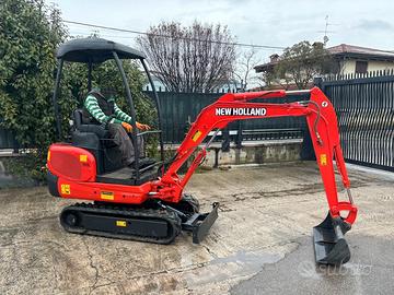 E166 Mini escavatore New Holland 15 q