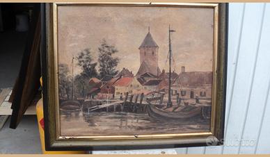 Quadro con cornice verde con barche e torre