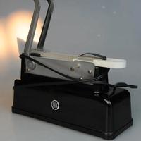 taglierina elettrica per macchina fotografica 