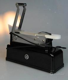 taglierina elettrica per macchina fotografica 