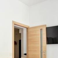 Lampadario a LED con braccia orientabili