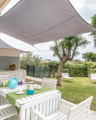 Appartamento vista mare con giardino