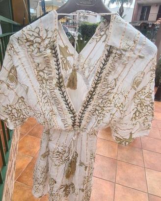 vestitino estivo con le attaccature di conchiglie