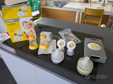 Tiralatte Medela Swing Maxi + scaldabiberon