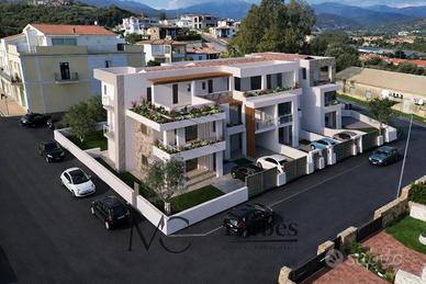 Budoni Centro - Moderno attico vista mare